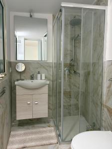 a bathroom with a shower and a sink at Casa Mediterraneo in Catania +10 photos