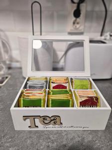 a box of food sitting on top of a counter at Ariana Urban Loft in Târgu-Mureş