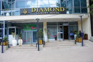 a building with a sign that reads diamond luxury hotel at Diamond Luxury Hotel plc in Desē