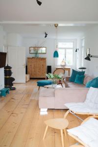 a living room with a couch and a table at Schmidsdorf 67 in Payerbach