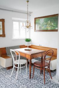 a dining room with a table and chairs at Schmidsdorf 67 in Payerbach
