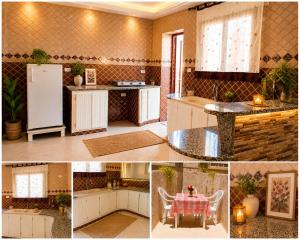 a kitchen with a refrigerator and a table in it at Your Peaceful Retreat in Kelibia