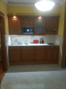 Kuchyňa alebo kuchynka v ubytovaní Szinva Apartman Miskolc