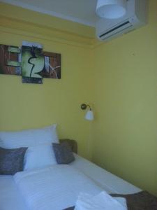 Posteľ alebo postele v izbe v ubytovaní Szinva Apartman Miskolc