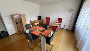 a dining room with a table and chairs at Apartment Kristian in Selnica ob Dravi