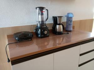 a blender sitting on top of a counter at AP Morro Branco in Beberibe