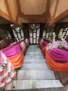 an overhead view of a room filled with flowers at Hotel Sartaj in Dera Bassi