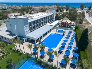 an overhead view of the resort with a pool and chairs at Sveltos Hotel in Larnaca