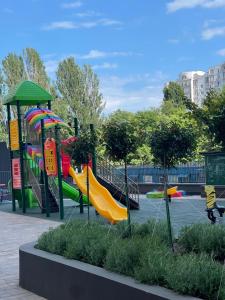 a park with a playground with slides at ЖК Модерн in Odesa
