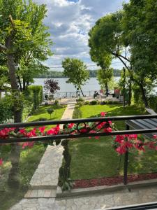 a view from a balcony of a park with flowers at Dunavska lepotica 2 in Belgrade