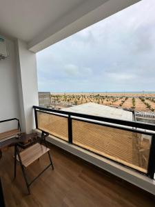 a room with a balcony with a view at Chez Gero Aeroport in Cotonou