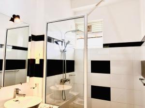 a bathroom with a shower and a sink at Ella Pine Crest in Ella +45 photos