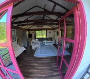 a room in a house with a red door at Una Bliss in Kulen Vakuf