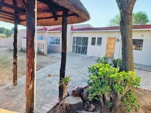 a view of a house from the courtyard at Ave Maria Camping site in Welkom