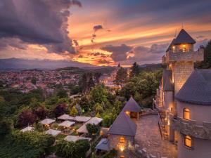 an aerial view of a castle at sunset at Royal Valentina Castle in Ognyanovo +235 photos