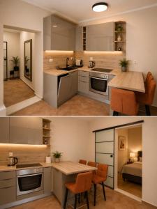 a kitchen with a sink and a table in a room at Frenchie suite in Lopud