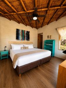 Katil atau katil-katil dalam bilik di El Cottage de Vasco +34 gambar