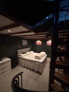 a bedroom with a large bed in a room at Kanalhuset in Tvååker