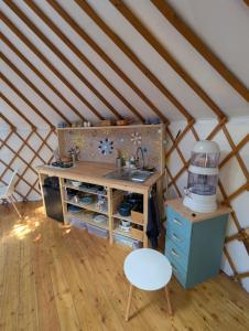 a bathroom in a yurt with a sink in a room at Martinická jurta in Martinice u Dolních Kralovic