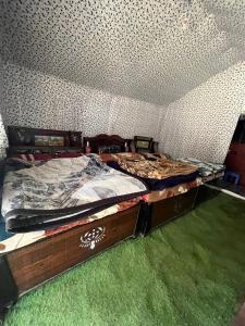 a bedroom with a bed in a room at Chaukhamba Camp Stay in Chopta +13 photos