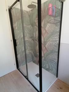 a glass display case in a room with a couch at Urban Suite- Holiday Rooms in Padova