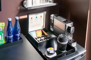 a coffee machine sitting on top of a counter at Flatiron Studio Near Madison Square Park in New York