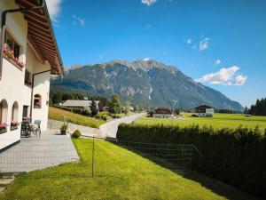 a house with a view of a mountain at Ferienwohnung Paula in Leutasch