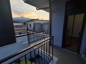 a balcony with a view of a city at pomelia holiday house in Riposto