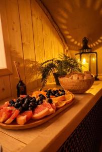 a counter with two plates of food on a table at Rezidence U Kapličky - stylové ubytování & privátní wellness - Adults Only in Uničov
