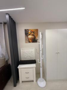 a bathroom with a sink and a toilet in a room at ستديو in Al Baha