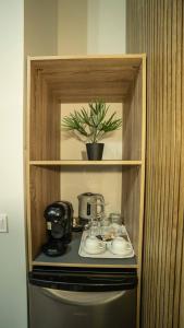 a cupboard with a stove with a pot on it at Casa NOBIL in Alicante