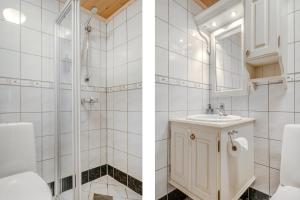 a white bathroom with a sink and a shower at Filefjellstuene hytter og leiligheter in Tyinkrysset +39 photos