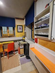 a small room with a kitchen and a dining room at Inspiration room - Toć in Split +38 photos