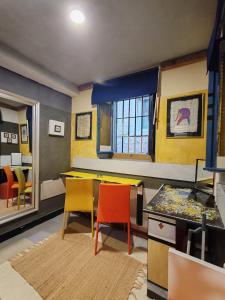 a room with a ping pong table and chairs at Inspiration room - Toć in Split