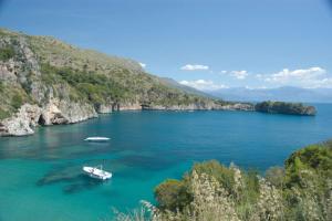 two boats in a large body of water at Pietramarina162 in Camerota
