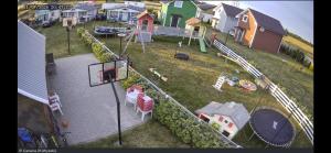 an aerial view of a backyard with a basketball hoop at Fioletowy in Niechorze
