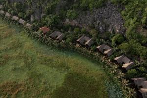 an aerial view of a group of houses on a hill at An Hideaway Resort in Ninh Binh