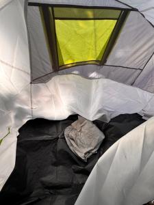 an inside view of a tent with a window at Pey camp in Saubion