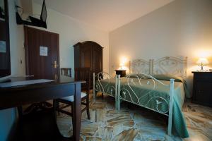 Posteľ alebo postele v izbe v ubytovaní Le Giare B&B