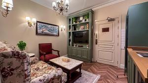 a living room with a couch and a table at The Classic Palace in Abha