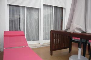 Posedenie v ubytovaní Ático con terraza y vistas