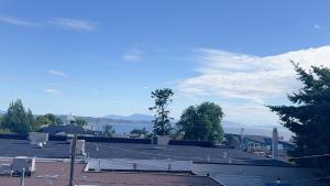 a view of a parking lot with a view of the water at Entire condo in White Rock, Canada in White Rock