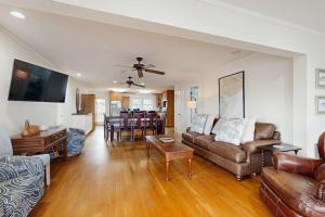 a living room with a couch and a table at The Answer in Edisto Island
