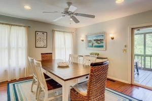a dining room with a table and chairs at Goldie's Retreat in Edisto Beach