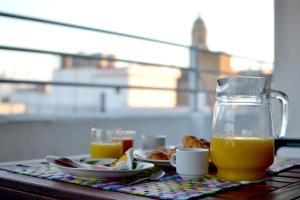 Možnosti raňajok pre hostí v ubytovaní Ático con terraza y vistas