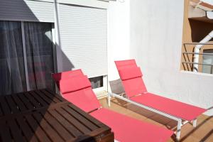 Posedenie v ubytovaní Ático con terraza y vistas
