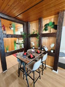 a dining room with a table and chairs at DIVA Studio in St. Blasien