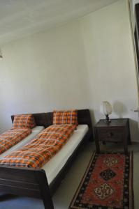 Ein Bett oder Betten in einem Zimmer der Unterkunft Hostel Engelberg