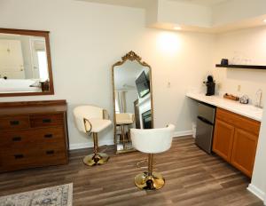 a bathroom with a sink and a mirror at Cypress River Inn & Spa in Snow Hill +99 photos
