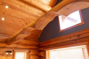 a wooden ceiling in a room with a window at Villa Rusutsu in Rusutsu
